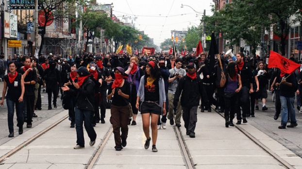 Harjap Grewal marching with the Black Bloc during the Toronto G20...