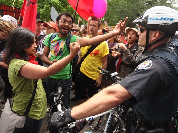 Harsha Walia & Syed Hussan insulting Toronto Police at the G20