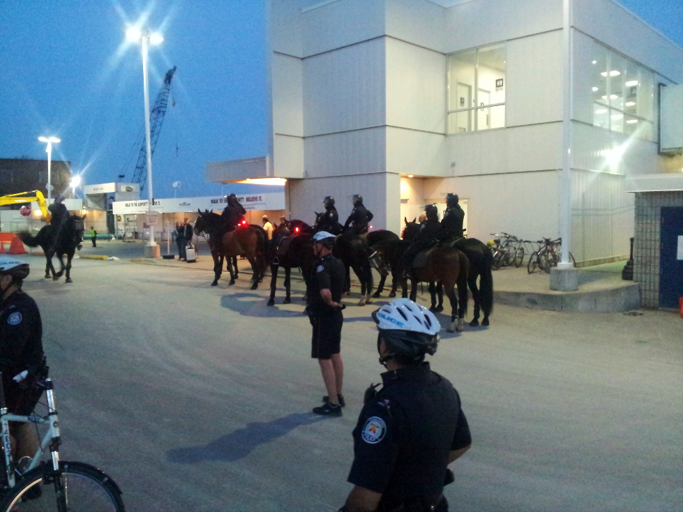 Horse cops waiting for the arrival of the rabble...
