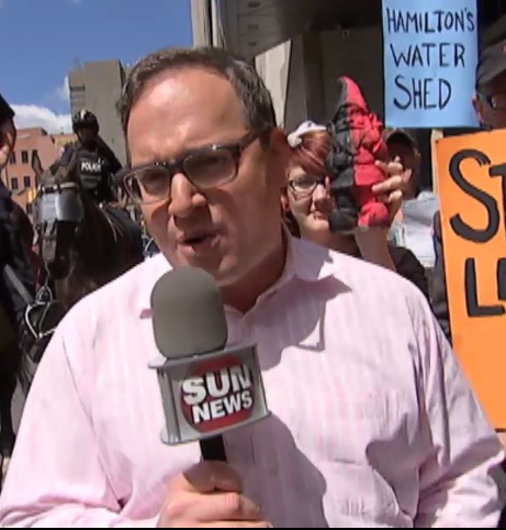 Ezra poses with Gnome Chompski...