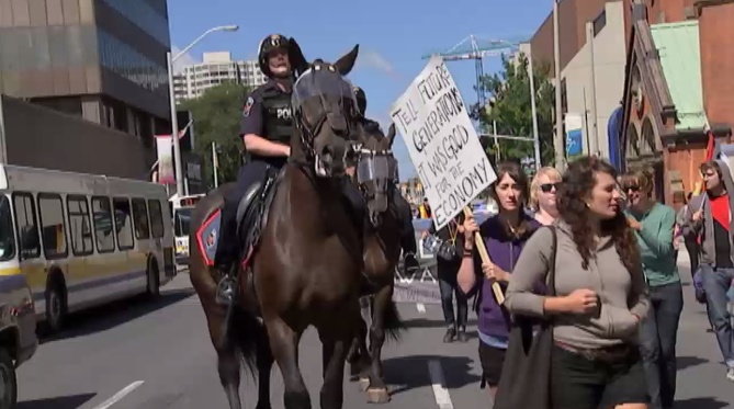 Hamilton mounted police pushing the crowd back...