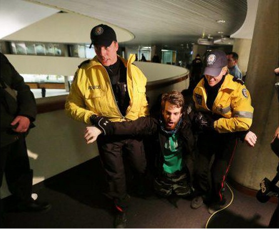 Pretester "Squid Newb" being pulled-out of Toronto City Hall back in February...