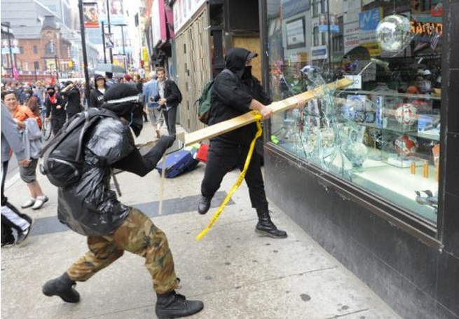 Elizabeth May says that this isn't a violent act...