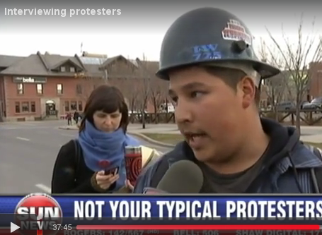 Sierra Club executive Chelsea Flook tailing Ezra Levant...