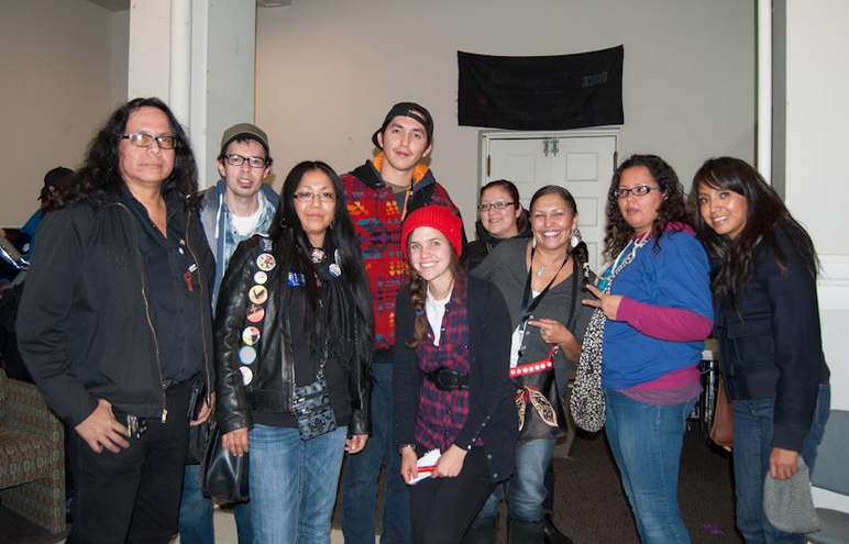 Bridgette DePape (centre, red hat) with some of the people interviewed by Ezra Levant
