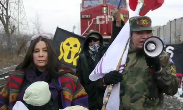 Cathy Walker & Davin Ouimet (and their baby) stopping a moving train in sub-zero temperatures