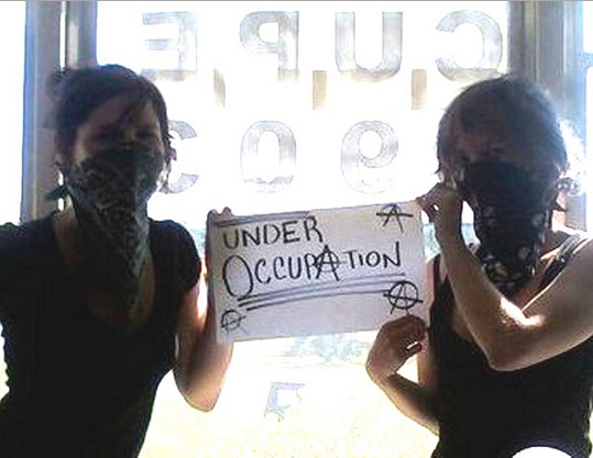 Taylor & Chelsea Flook show-off their masks in what they call a "CUPE Joke"