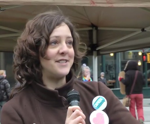 Sarah Buheler, wearing her Occupy Vancouver & OpenMedia pins
