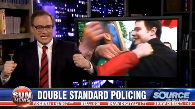 Chris Waddell mobbing Ezra Levant.