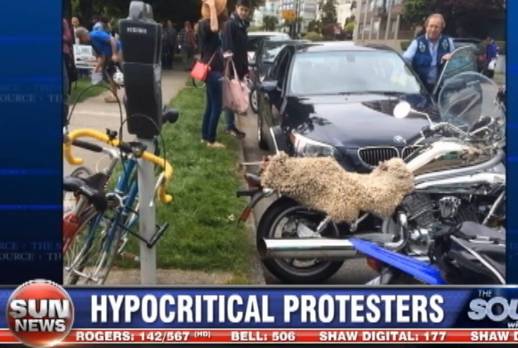 Art Sterritt parking his shiny BMW at a Vancouver anti-oil protest