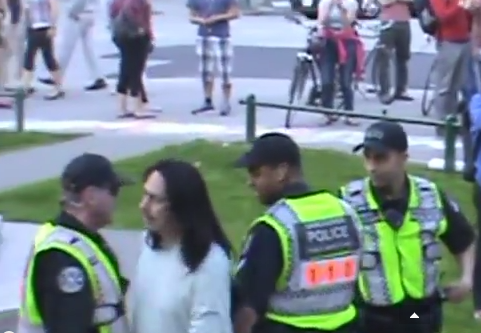 Dan Wallace pushing his way through the police