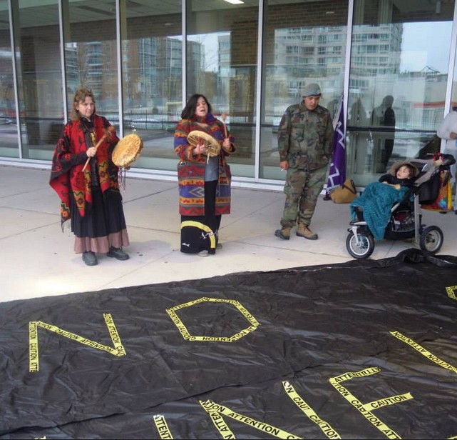 Carrie Lester, Cathy Walker, Davin Ouimet prepare to march...