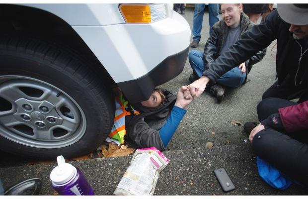 Jakub under a Kinder Morgan truck...