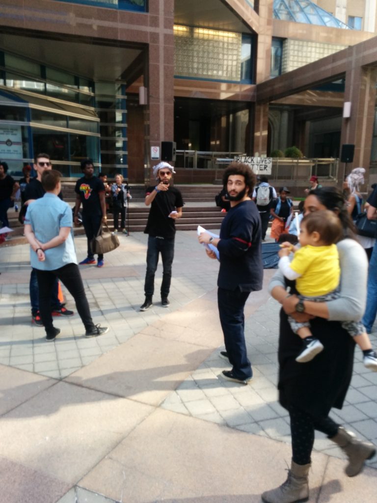 Zidane Mohamed (carrying papers) looked shocked to see me...