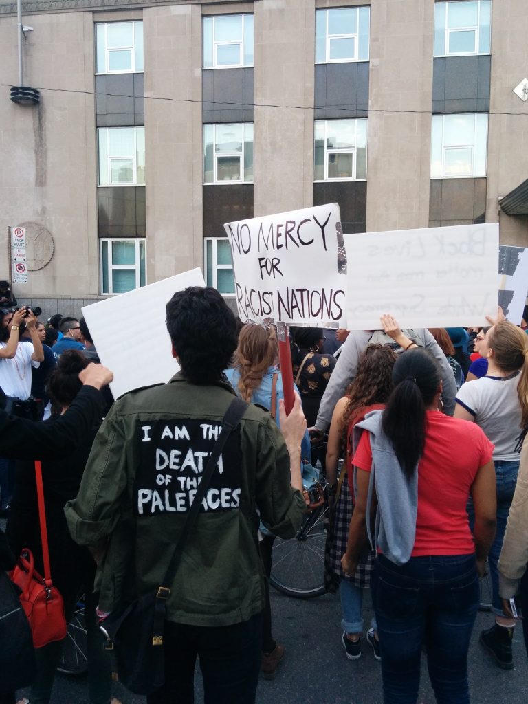 Going to an anti-racism event- why not write a racist statement on your jacket!