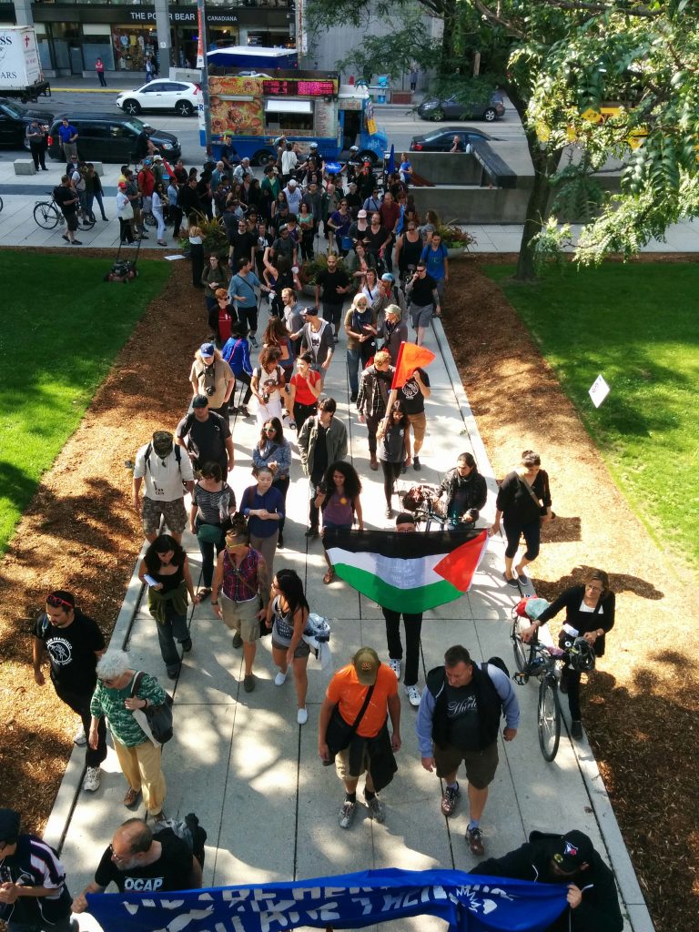 Protesters march into City Hall after a long day of nothing...