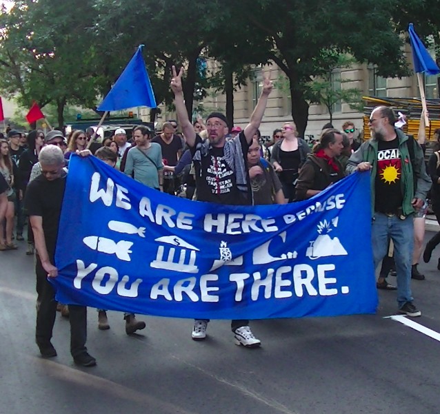 John Clarke (left) of OCAP has a long history with riots...
